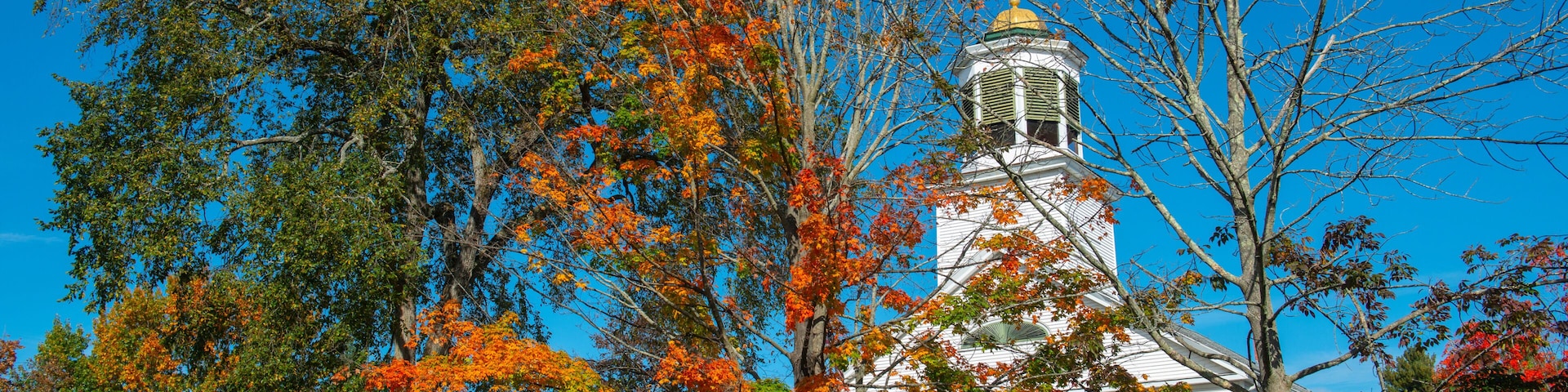 First Church of Merrimack on 7 Baboosic Lake Rd in fall in Merrimack, New Hampshire, USA.