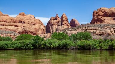 Water view from the Colorado River along the bluffs and rock sculpture outside Moab, Utah