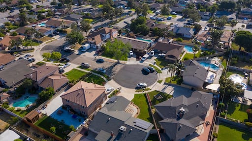 Daytime aerial view of housing in Fontana, California, USA.