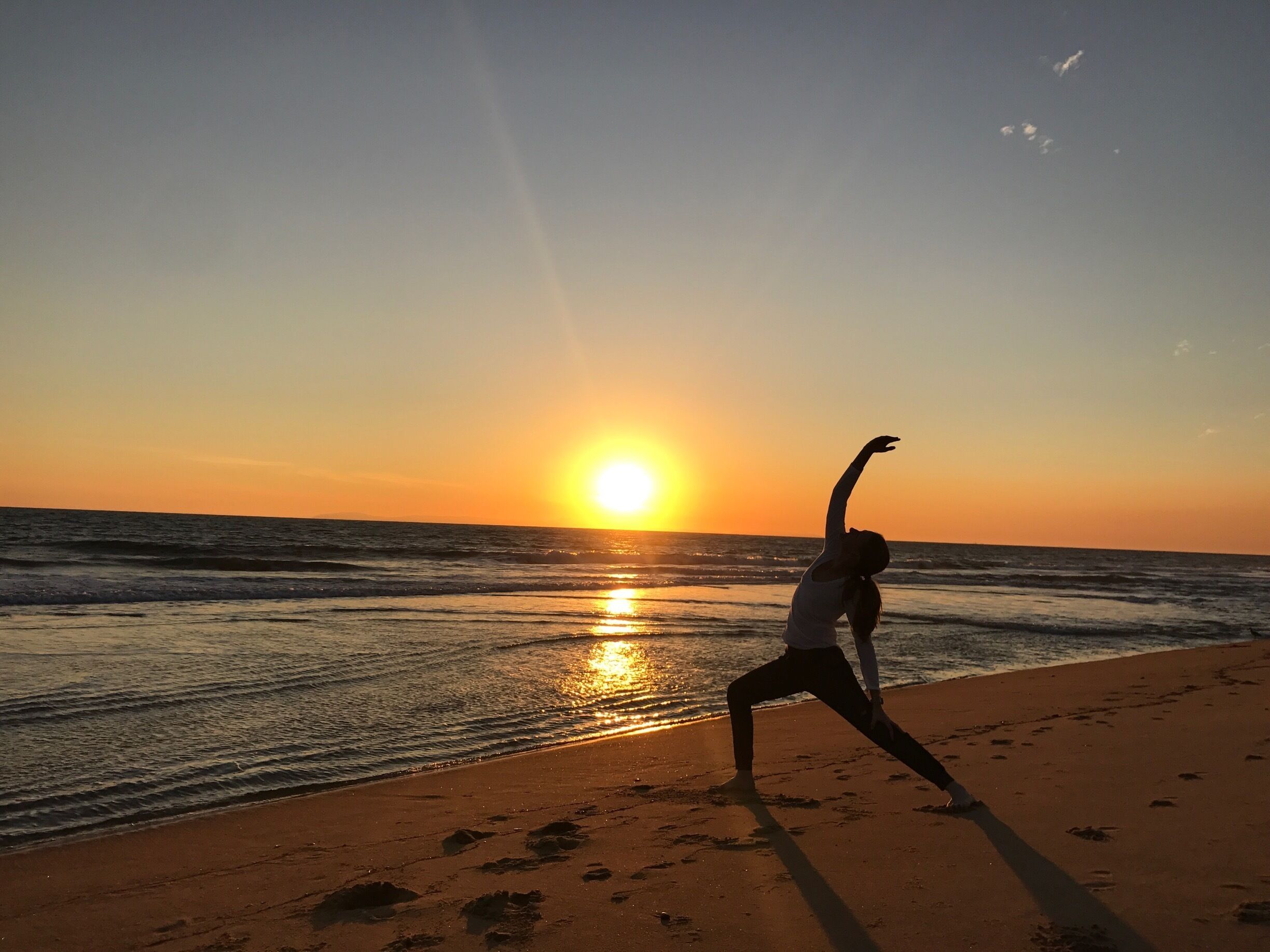 The beach clears out after 4...just in time for some sunset yoga. #lens4change #BeachBound