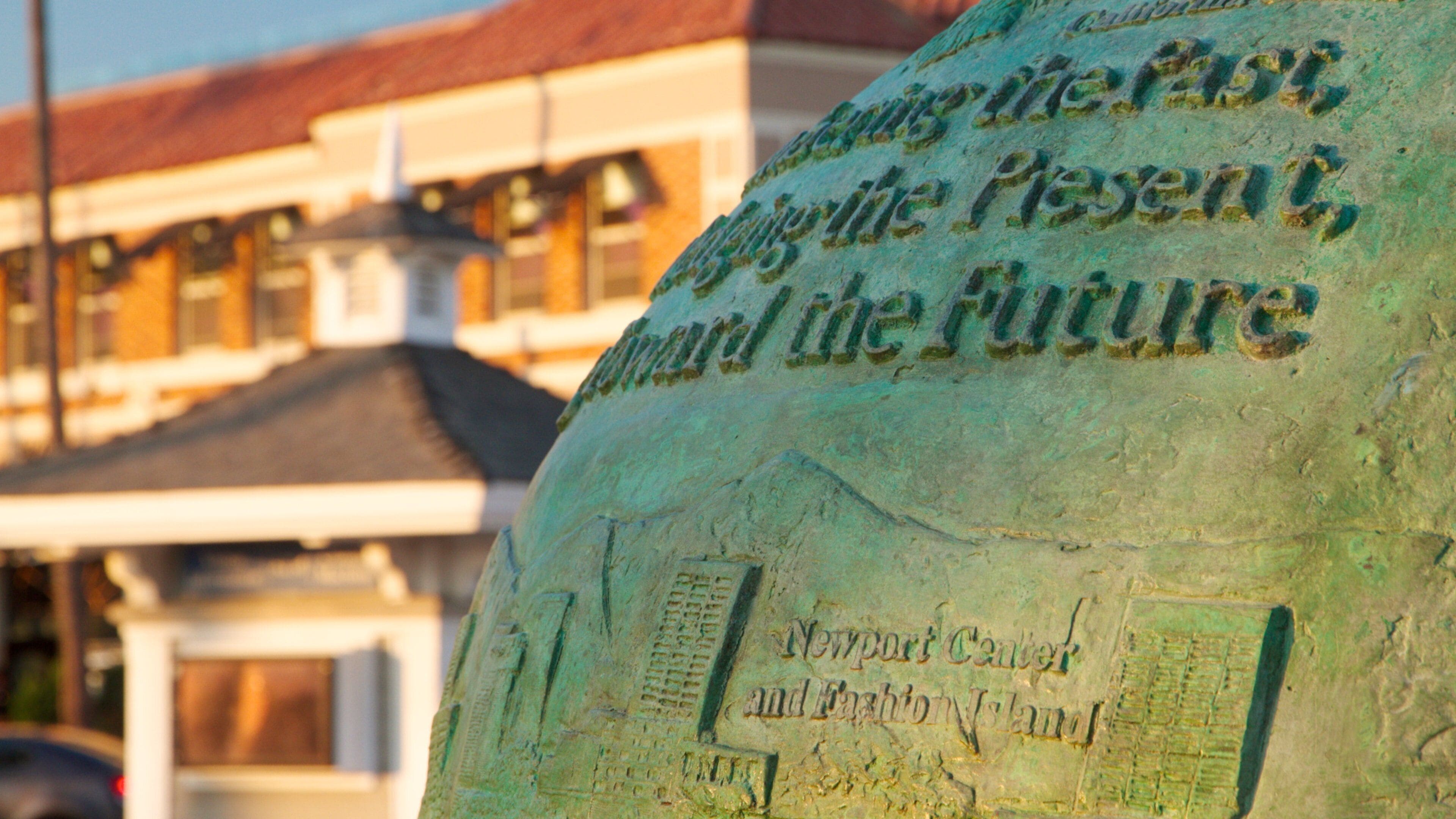 Newport Beach featuring a monument and signage
