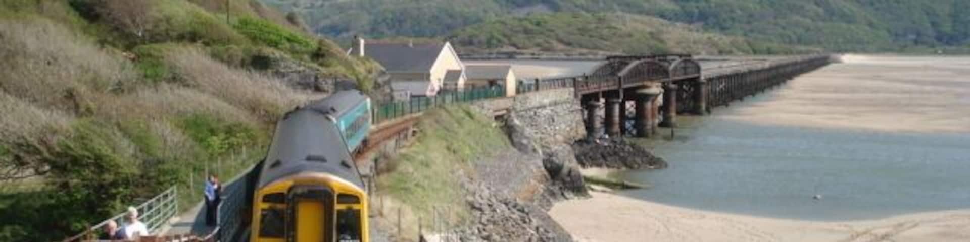 Railway at Barmouth The train is about to cross the Mawddach estuary bridge, which is half a mile long.