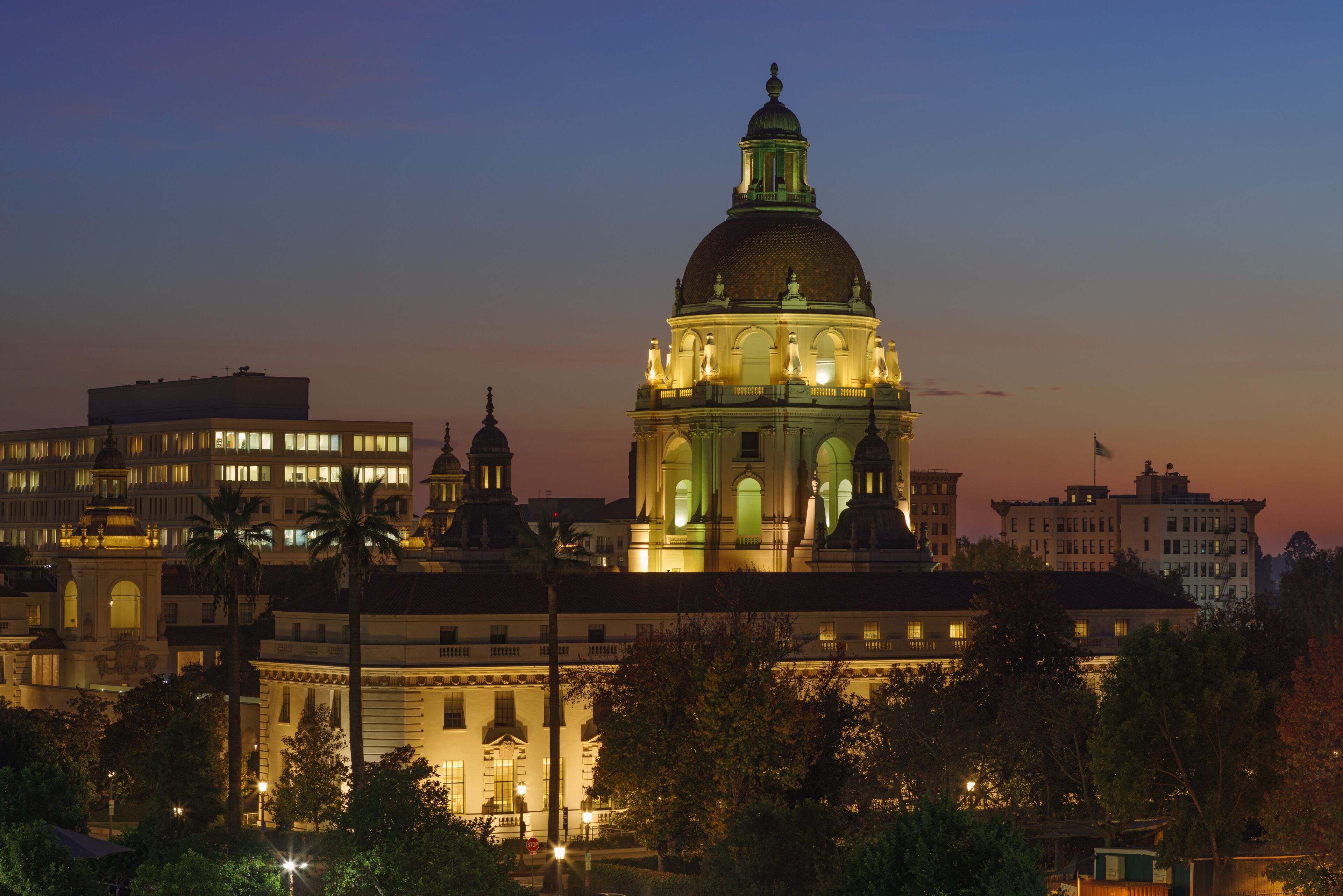 Vibrant image of the Pasadena City Hall in the foreground. Pasadena is located in Los Angeles County. Photo made at dusk.