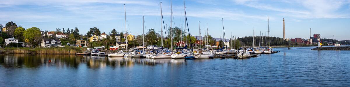 Sodertalje, Sweden - May 11, 2021: Panoramic view on the harbour in Igelsta in Sodertalje with sailboats on sunny afternoon in May