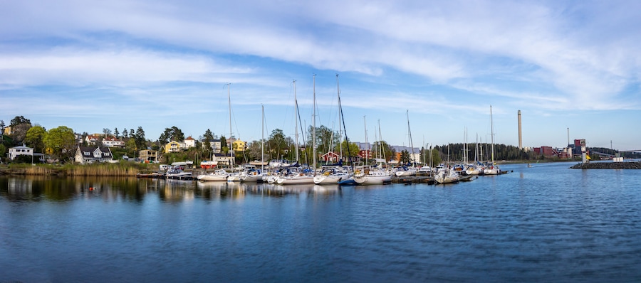 Sodertalje, Sweden - May 11, 2021: Panoramic view on the harbour in Igelsta in Sodertalje with sailboats on sunny afternoon in May