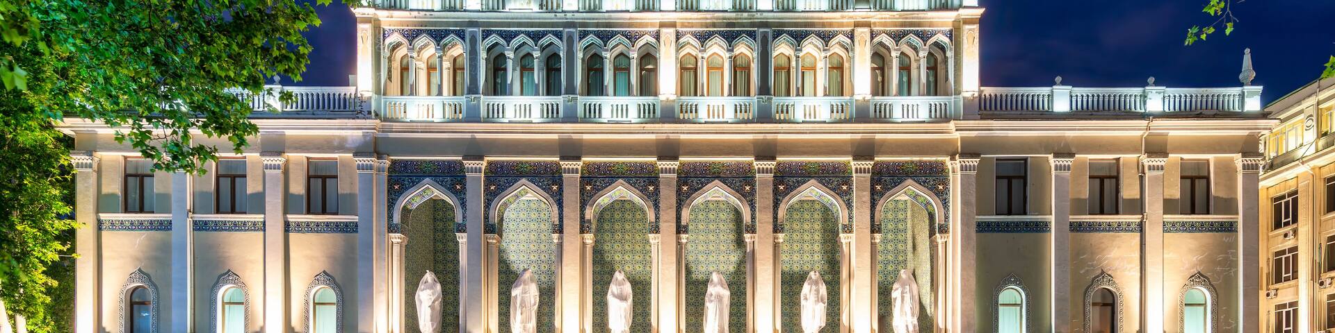 Night shot of illuminated The Nizami Museum of Azerbaijani Literature in Baku, Azerbaijan