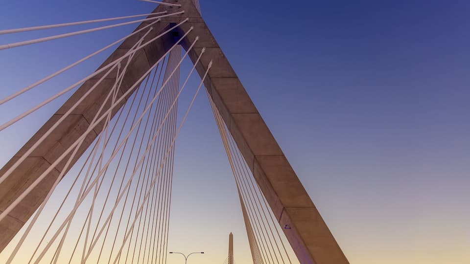 A cable-stayed bridge with multiple cables and towers.