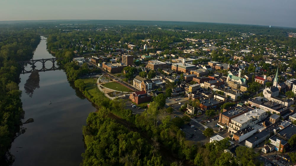 Aerial view of Fredericksburg Virginia on Rappahannock River at sunset after storm with rainbow