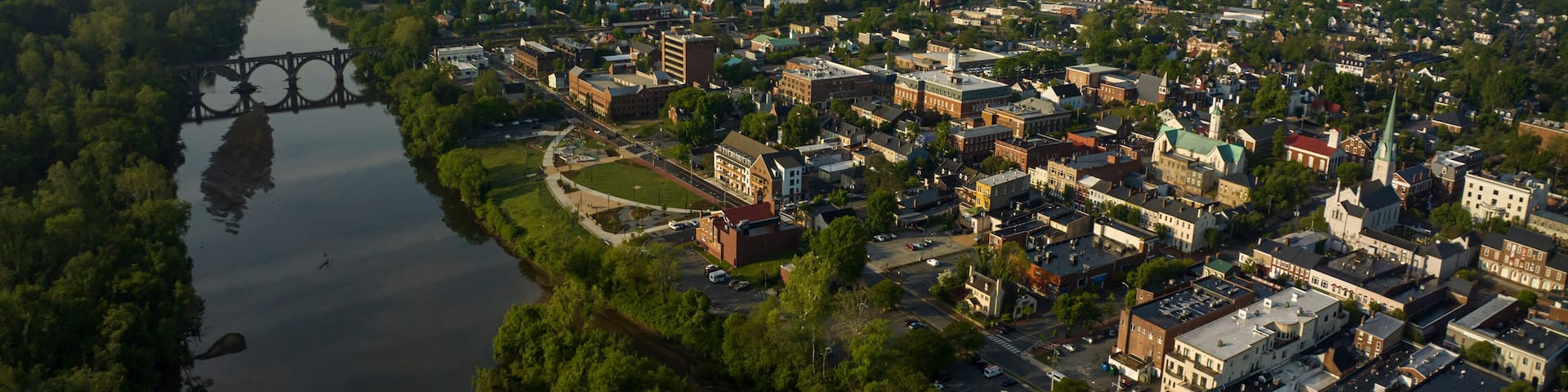 Aerial view of Fredericksburg Virginia on Rappahannock River at sunset after storm with rainbow