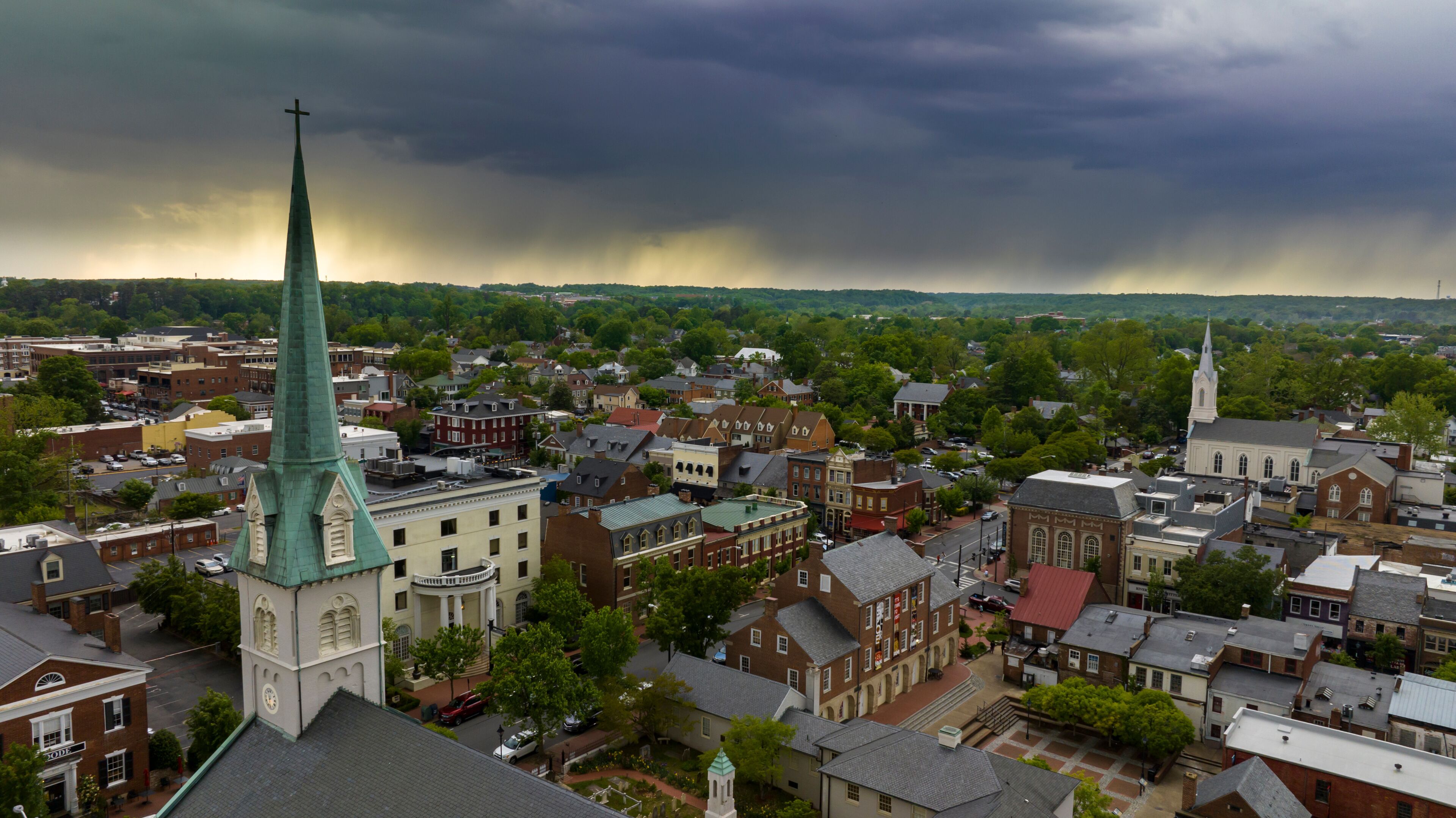 Aerial view of Fredericksburg Virginia on Rappahannock River at sunset after storm with rainbow