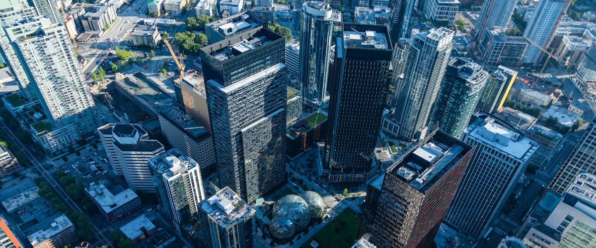 Aerial view of modern architecture featuring Amazon Spheres and skyscrapers in South Lake Union, Seattle, United States.