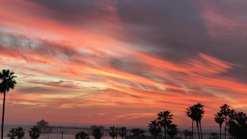 Sometimes you don't have to go very far to captured beautiful sunset. Surf City USA Huntington Beach California. One of the best beaches along the coast of Southern California.