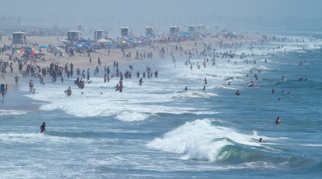 Huntington Beach which includes a beach, landscape views and waves