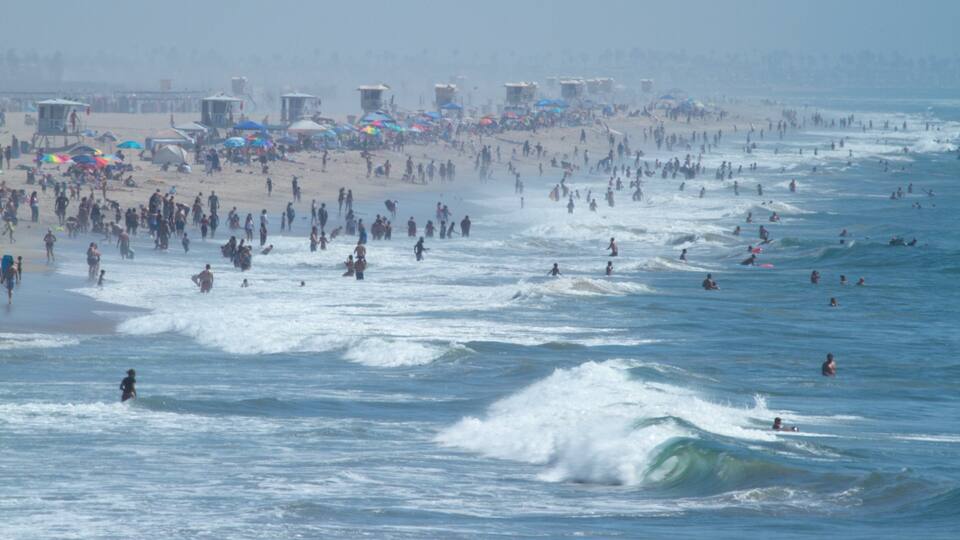 Huntington Beach which includes a beach, landscape views and waves