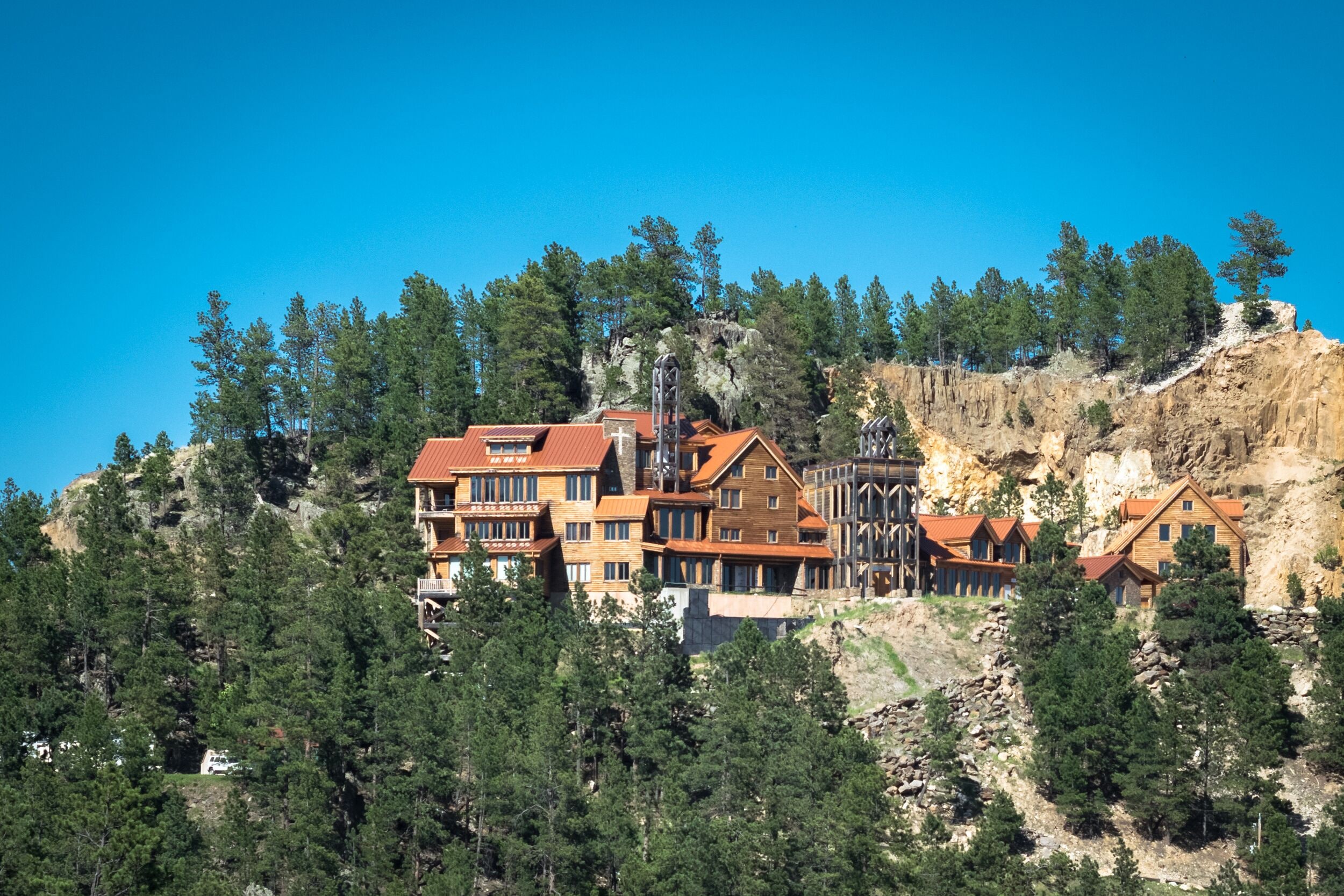 Scenic architecture and spruce trees on a hill in Keystone, South Dakota, USA. Keystone is a favorite place among tourists in the Black Hills of South Dakota.