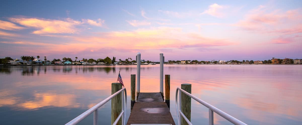 Redington Shores featuring a sunset and a river or creek