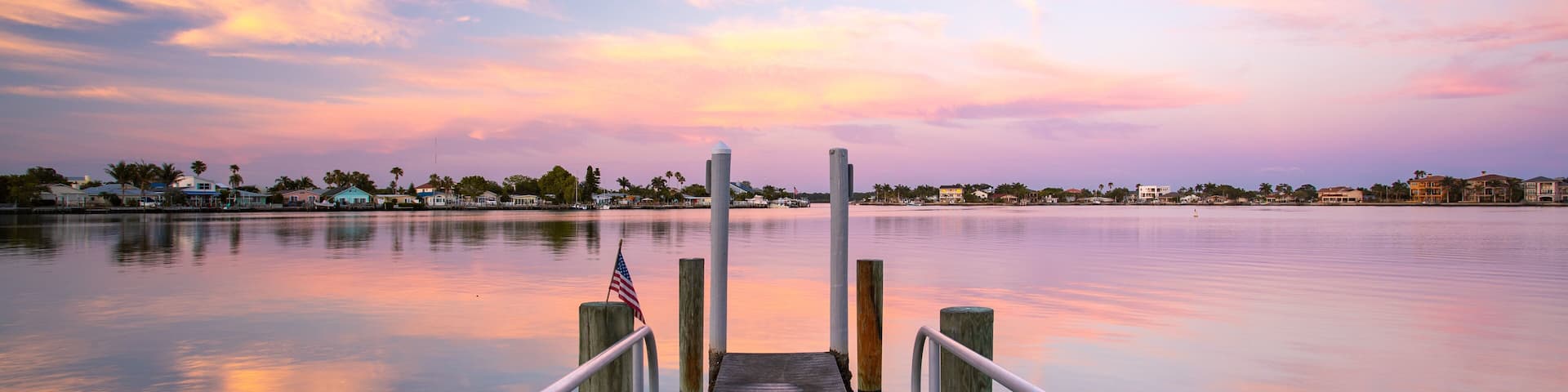 Redington Shores featuring a sunset and a river or creek