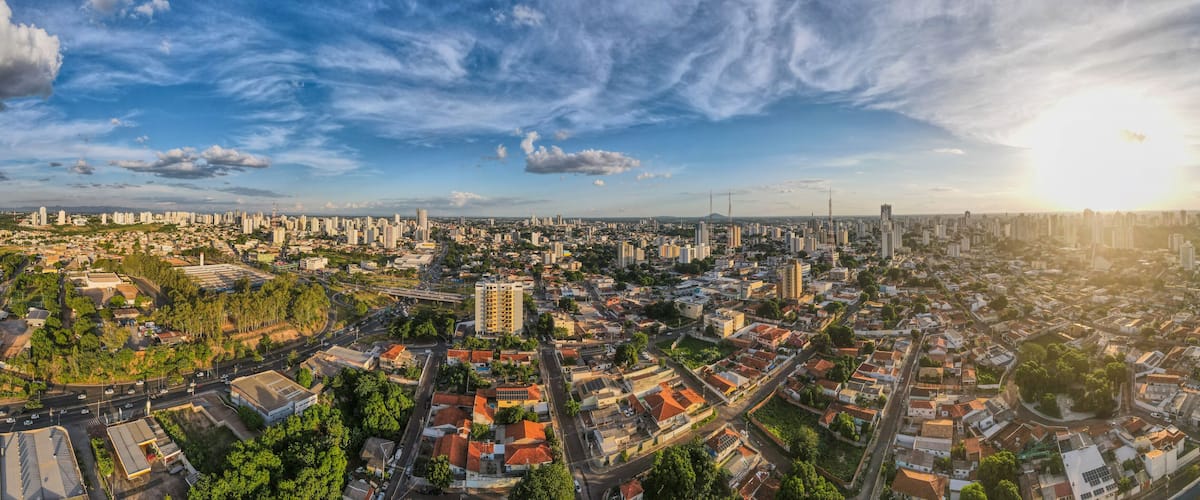 Aerial city scape during sunny summer day in Cuiaba Mato Grosso