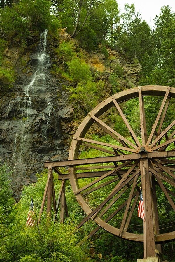 There are several Bridal Veil Falls in Colorado but this one is best viewed after strolling under I-70 via the Charlie Taylor Waterwheel Trail in Idaho Springs. #travel #roadtrip #colorado #waterfalls 