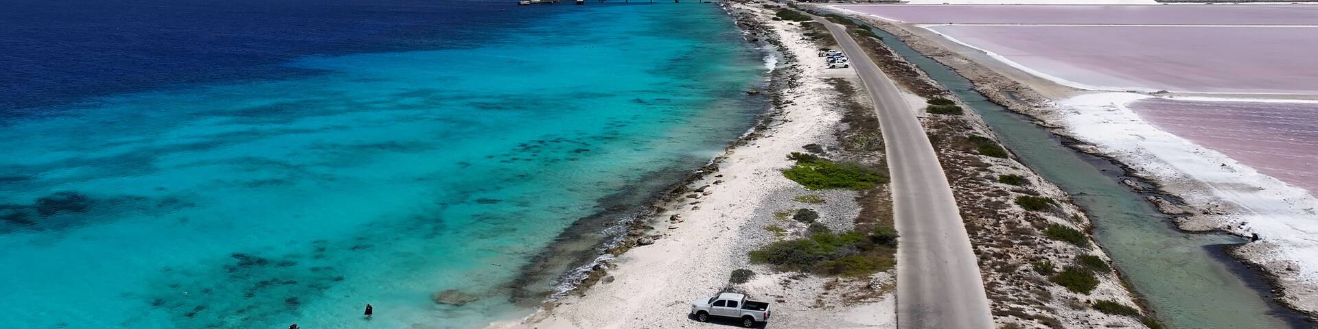 Salt Pier At Kralendijk In Bonaire Netherlands Antilles. Island Beach. Blue Sea Landscape. Kralendijk At Bonaire Netherlands Antilles. Tourism Background. Nature Seascape.