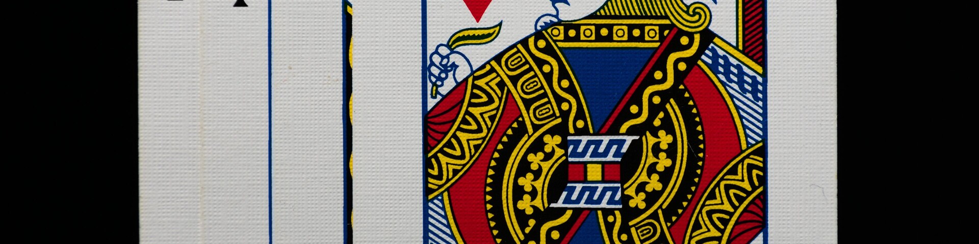 Set of four Jacks from a deck of playing cards, arranged in a row. A classic card combination symbolizing strategy, luck, and the excitement of card games.