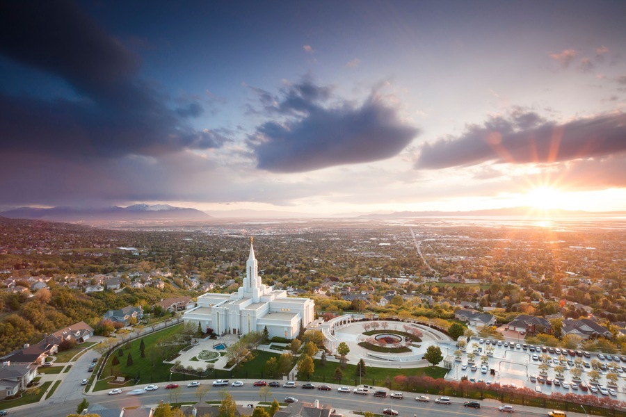 The Mormon (LDS) Temple in Bountiful Utah sits above the Great Salt Lake at dusk.