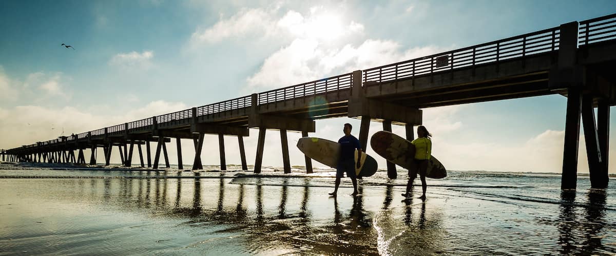 Jacksonville Beach showing a beach, views and surfing