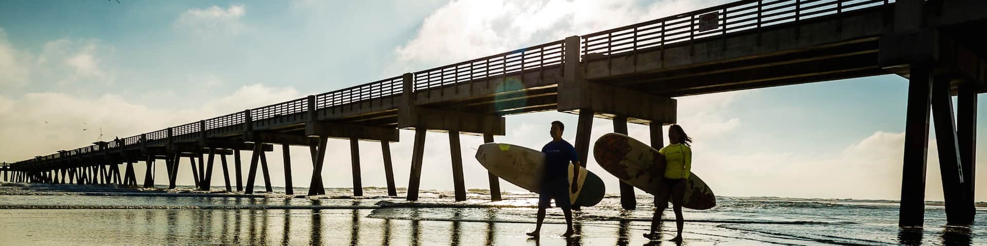 Jacksonville Beach showing a beach, views and surfing