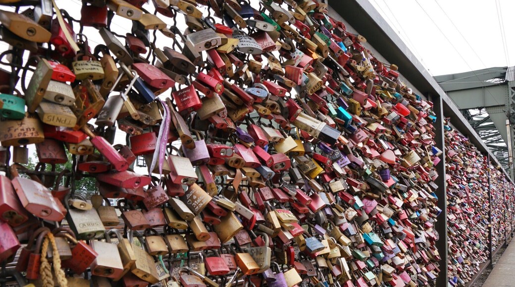 Padlock bridge in Cologne. Despite it appearing there is no room for another lock when looking at it straight on, there is still space on here for more locks. This entire side of the bridge is full like this and now the other side of the bridge and the entrance and exit points are starting to fill up too.
Easily accessed from the Cathedral / Central Train Station on foot.
I wonder how many of these couples are still together...?