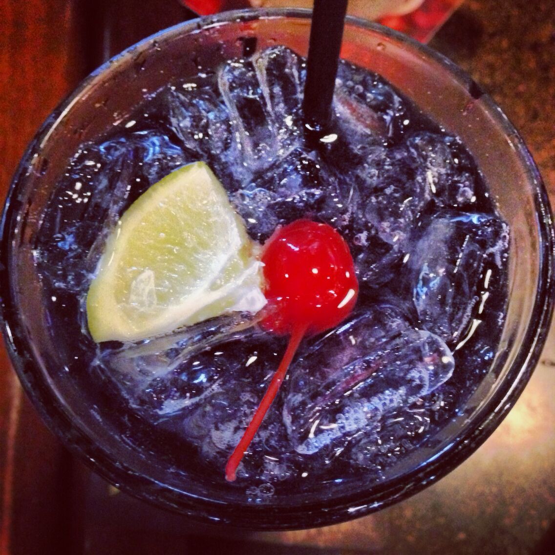 This beautiful concoction I ordered at my friend's birthday party is the adult version of a grape soda: a Purple Viper.  It filled me with happiness and nostalgia!
The armadillo eggs are good too.