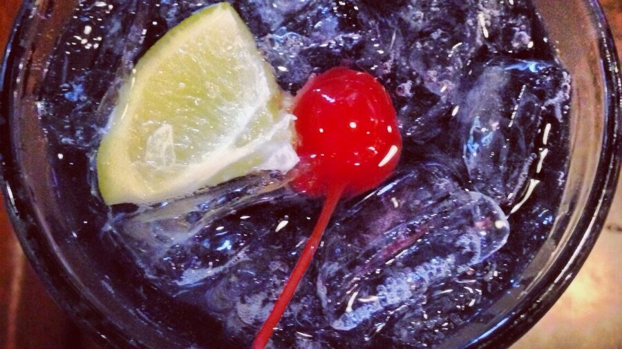 This beautiful concoction I ordered at my friend's birthday party is the adult version of a grape soda: a Purple Viper. It filled me with happiness and nostalgia!
The armadillo eggs are good too.