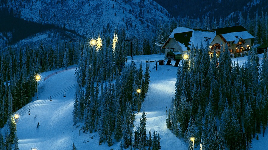 Kellogg featuring night scenes, snow and a gondola