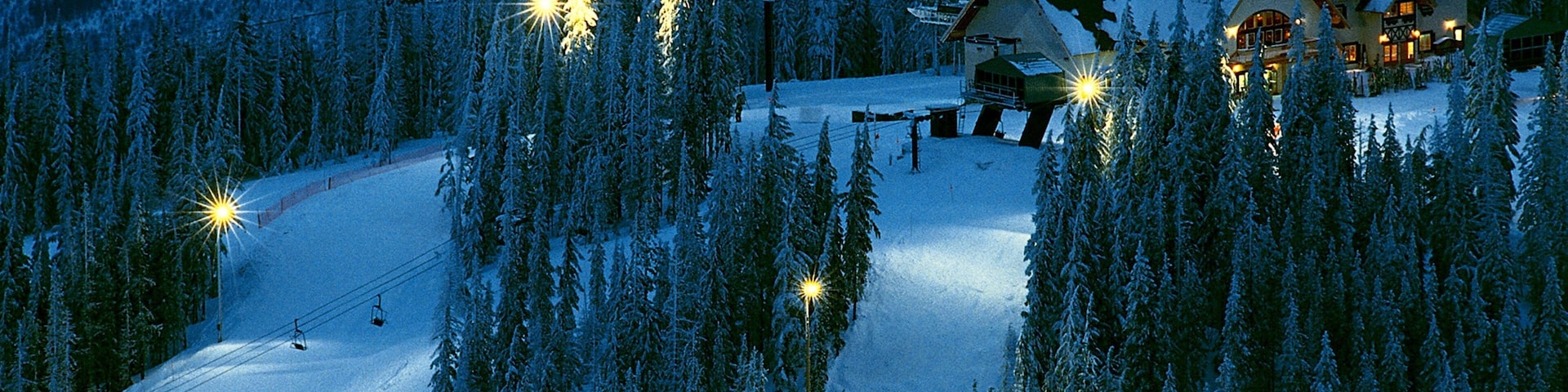 Kellogg featuring night scenes, snow and a gondola