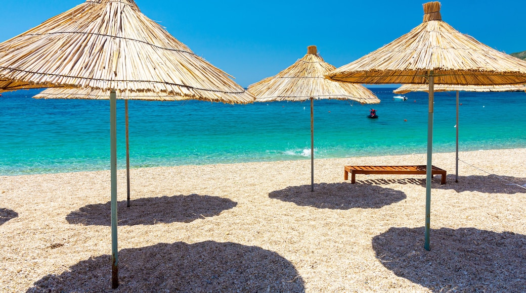 umbrellas on Jale beach on albanian riviera, Albania