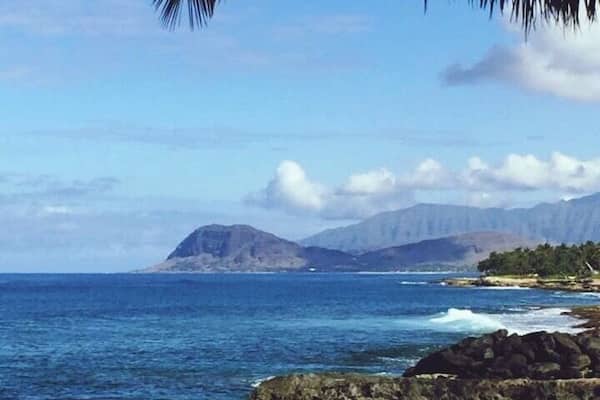 West Oahu, just a few miles further from Kapolei, to an area know as Ko'olina. There are 4 man-made lagoons and this photo is taken from Lagoon 3 (Naia Lagoon), on the Eastern point looking West. Well protected from the open ocean. Great place to take small children to play in the water. You can't see the lagoon in this pic, but this view is one of my top 10 views in Hawaii.