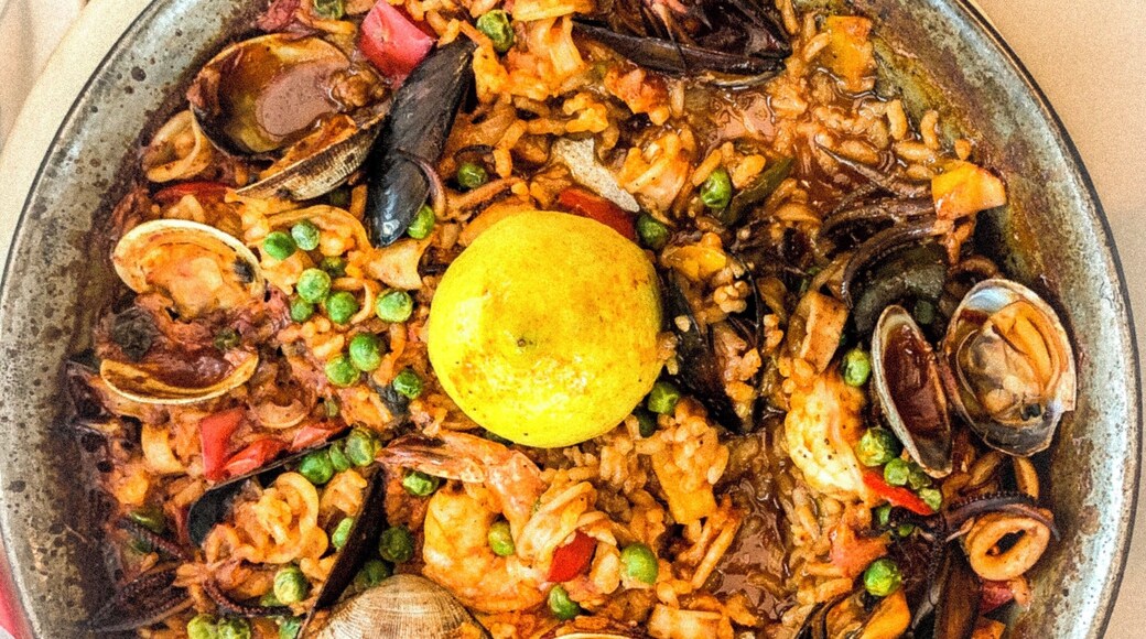 Interesting spot to enjoy your seafood dish with a good view of HalfMoon Bay . This is Seafood Paella ordered at Sam’s Chowder House #troverfoodies
