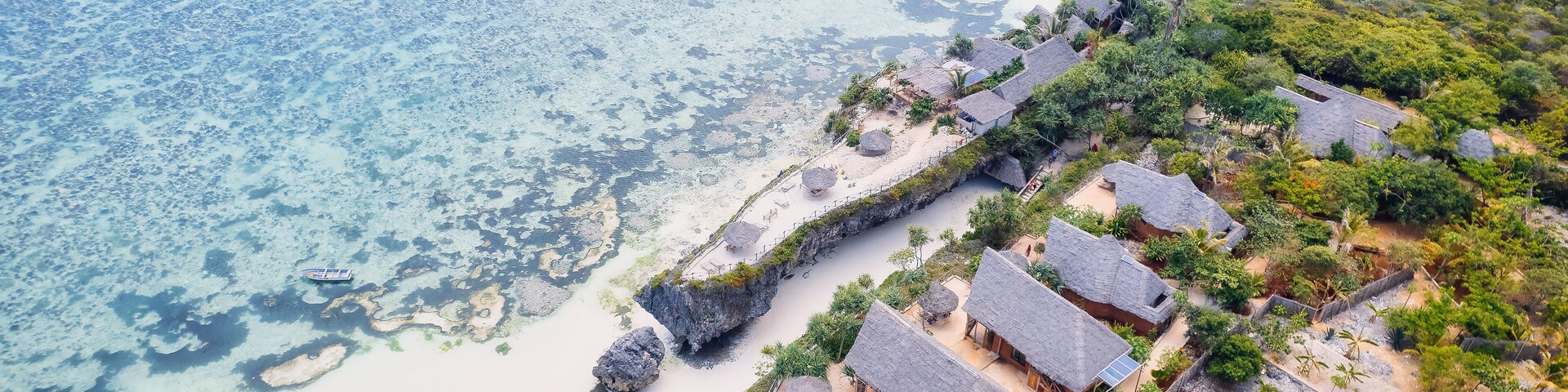 Experience the breathtaking view of Mtende Beach in Zanzibar, Tanzania, and enjoy a relaxing day by the ocean. The beach view will take your breath away and create unforgettable memories of your time
