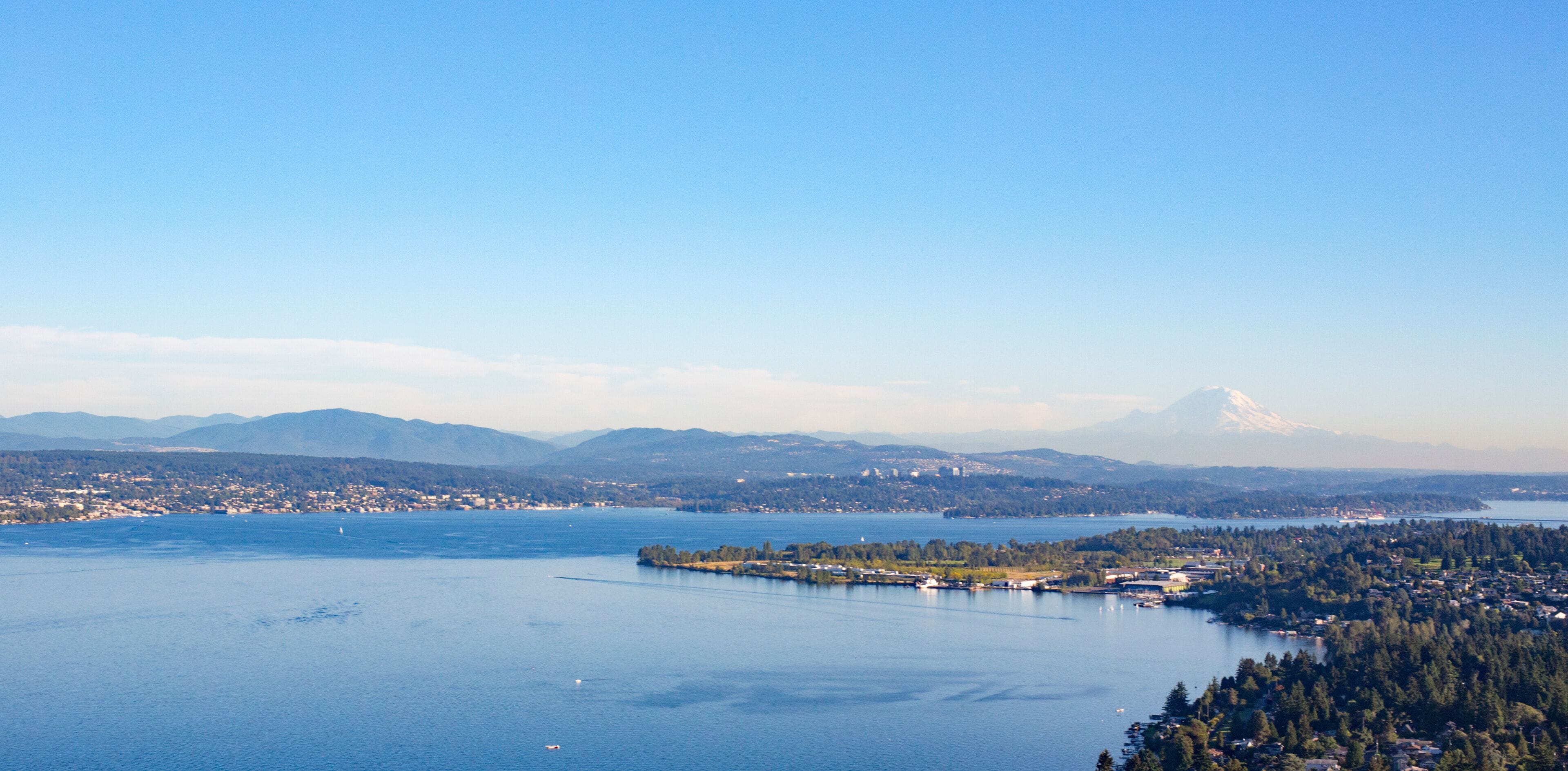 Aerial Shot of Forests, Lake, and Suburban Neighborhoods of Shoreline, Sand Point, North Seattle, Magnuson Park, Lake Washington, and Mt Rainier