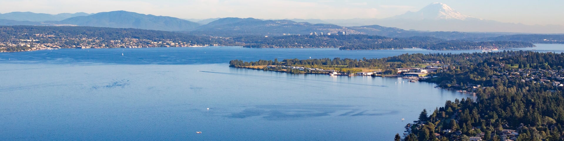 Aerial Shot of Forests, Lake, and Suburban Neighborhoods of Shoreline, Sand Point, North Seattle, Magnuson Park, Lake Washington, and Mt Rainier