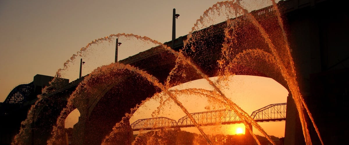 Water cannons at sunrise.