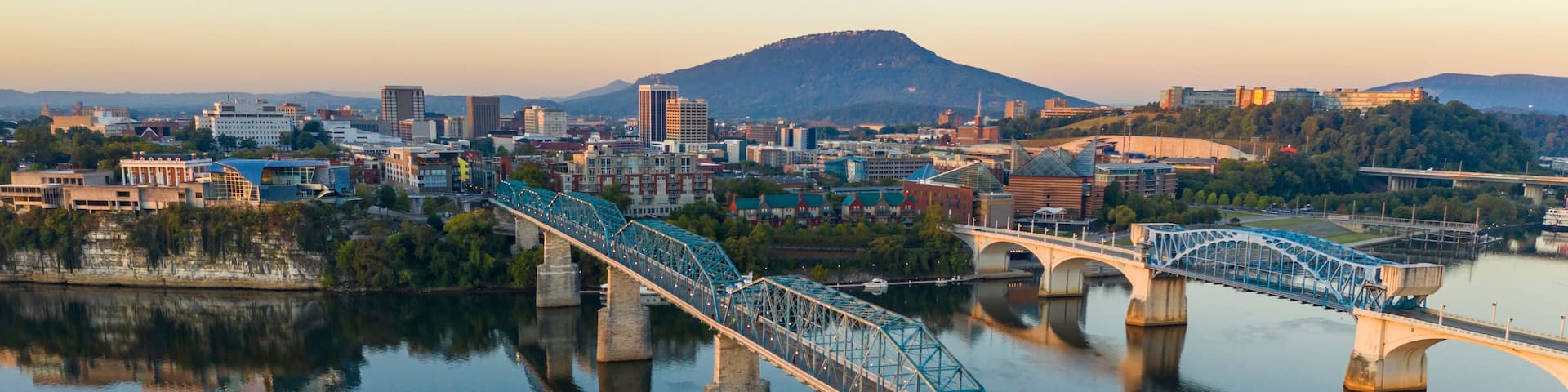Sunrise comes to Lookout Mountain standing behind Downtown Chattanooga Tennessee