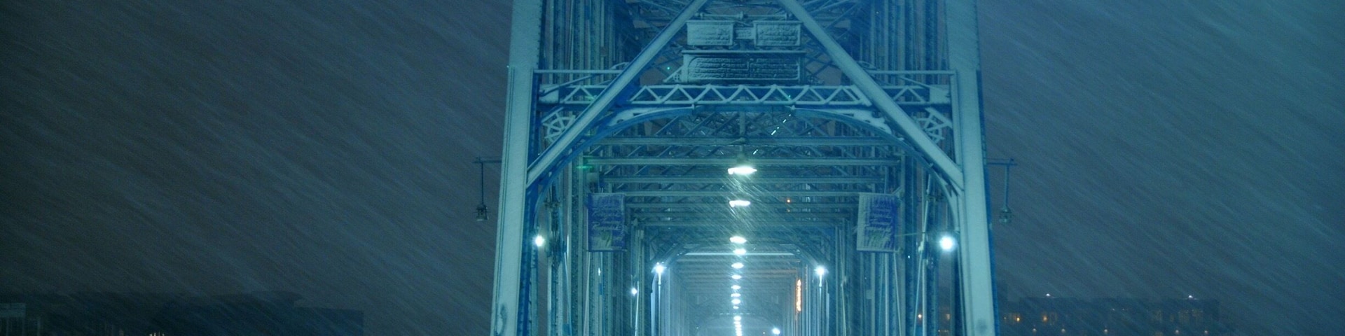 Snowing on the walking bridge.