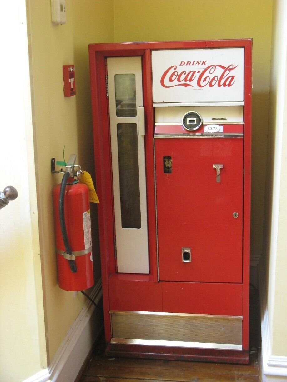 When was the last time you saw one of these? And yes, it dispenses Coke in glass bottles.  And yes, it tastes fantastic!