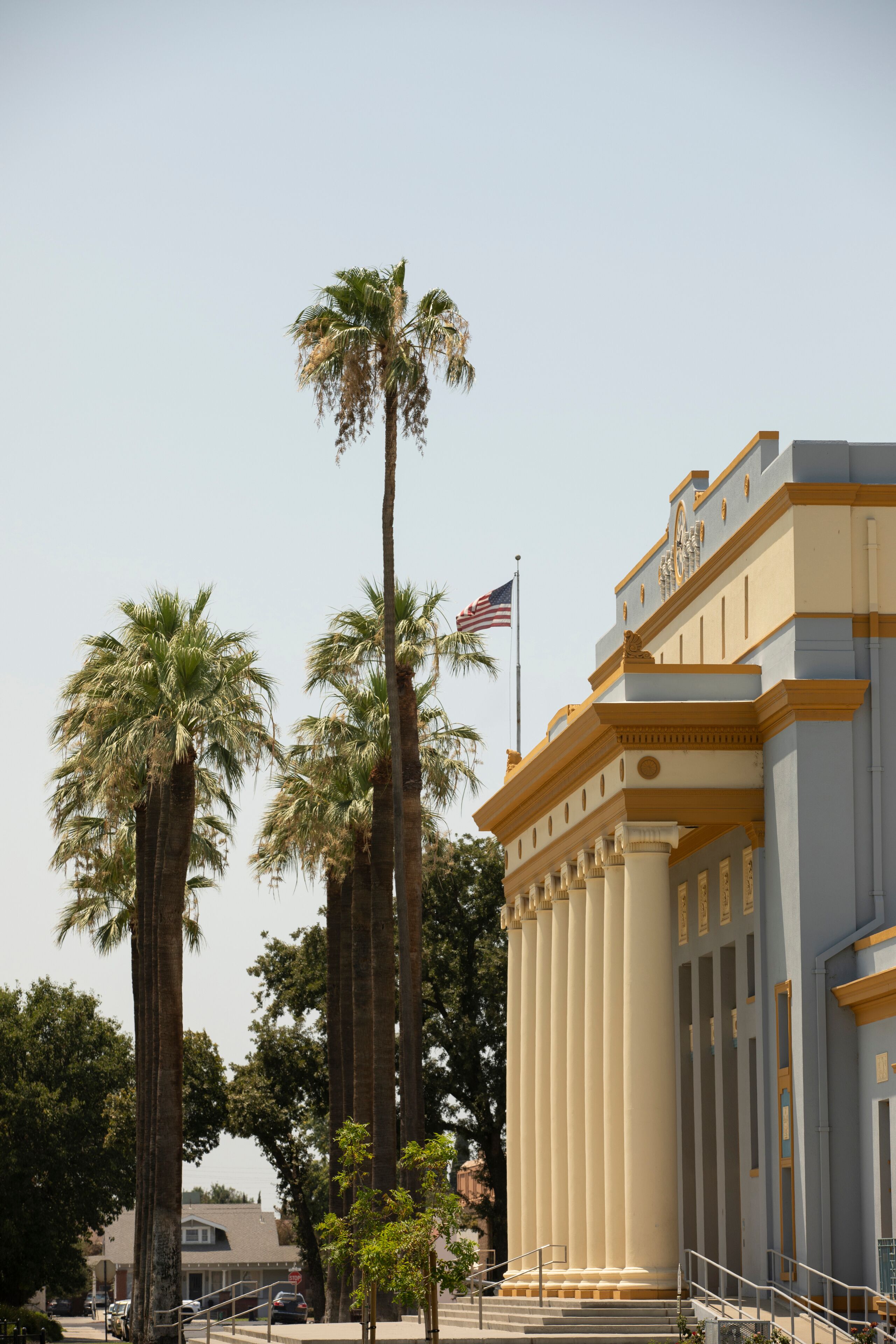 Afternoon sun shines on historic buildings of downtown Hanford, California, USA.