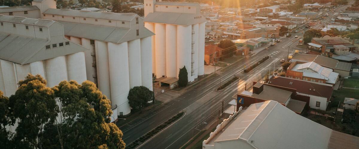 Kingaroy which includes a small town or village, landscape views and a sunset