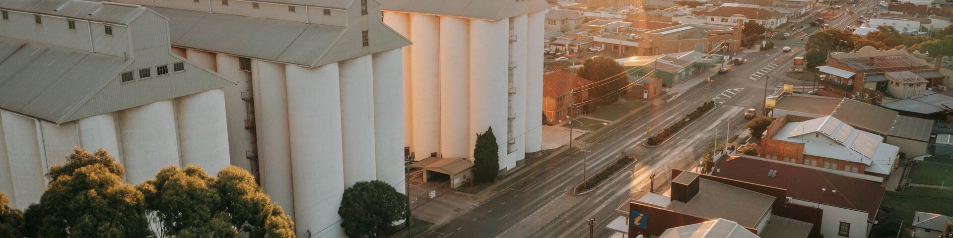 Kingaroy which includes a small town or village, landscape views and a sunset