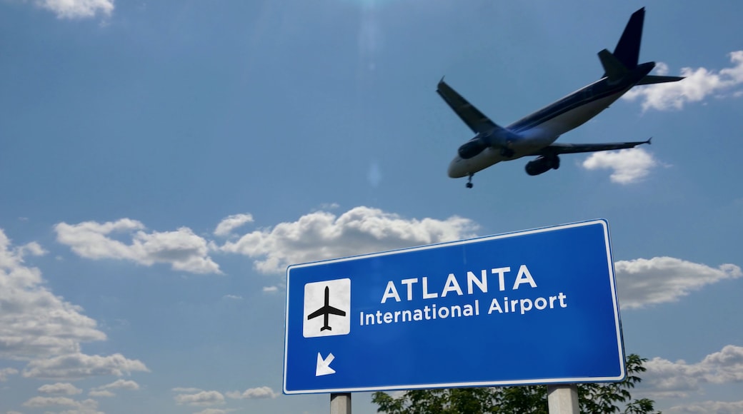 Plane landing in Atlanta with signboard