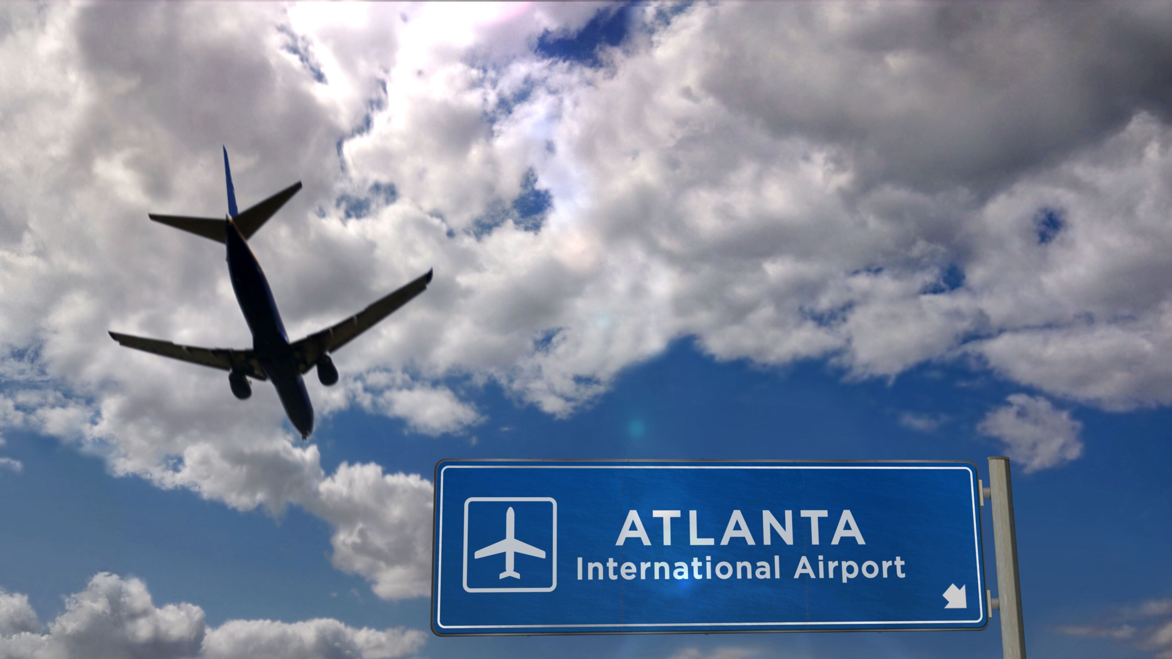 Plane landing in Atlanta with signboard