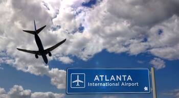 Plane landing in Atlanta with signboard