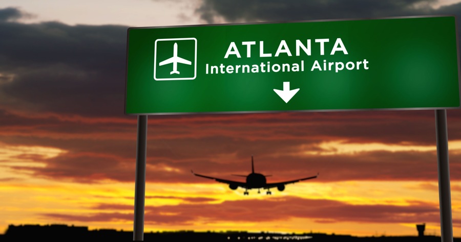 Plane landing in Atlanta with signboard